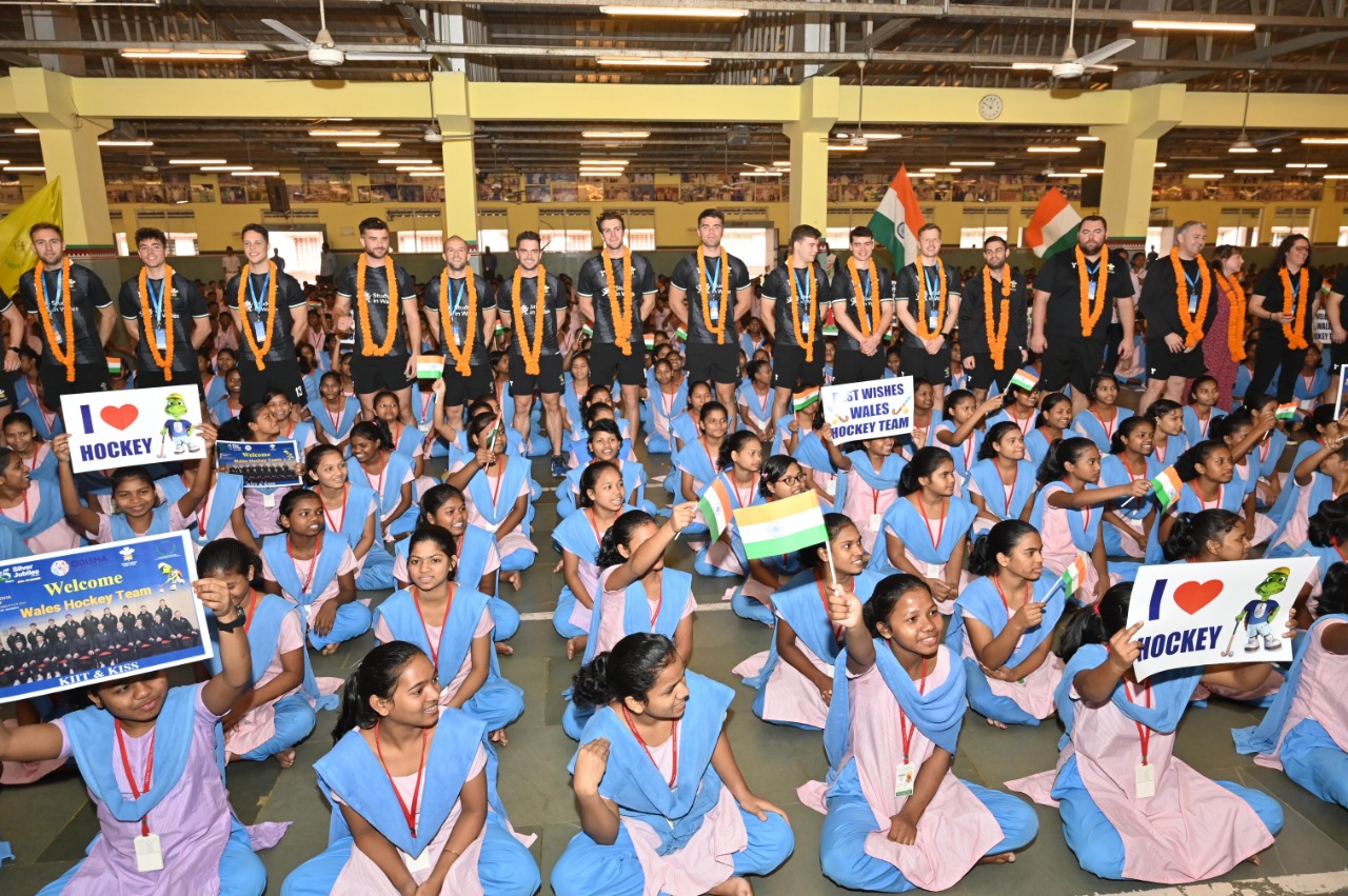 Hockey Wales players with school children in Odisha, India