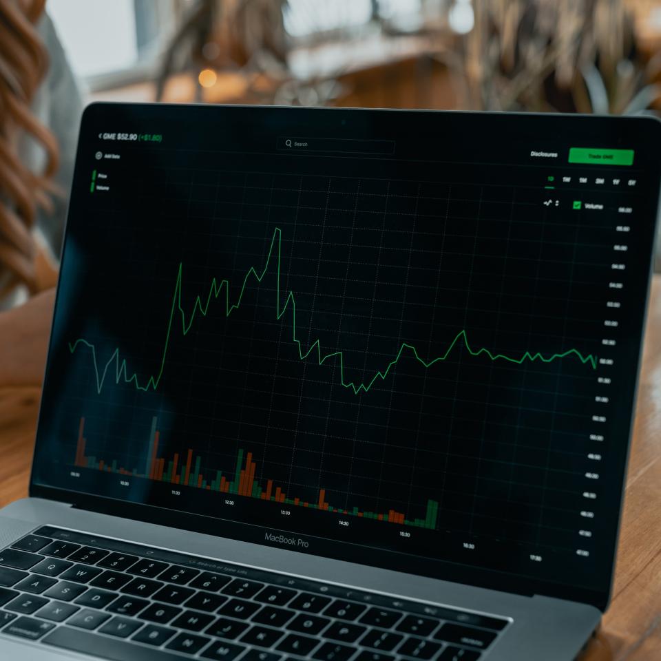 A laptop showing a graph