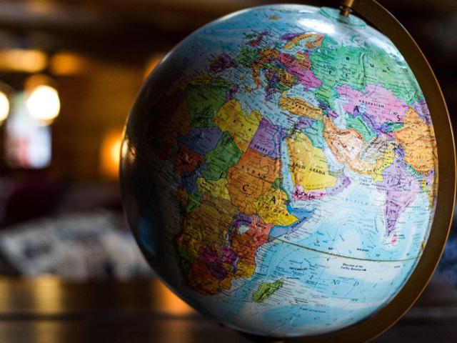 A globe in a dimly lit room
