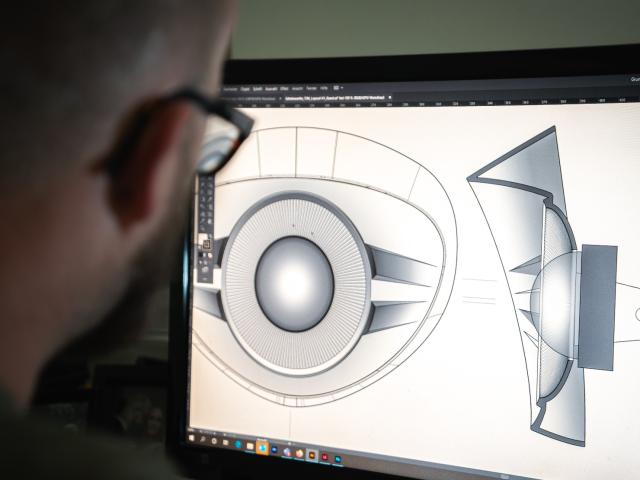Man working on a design-based computer programme