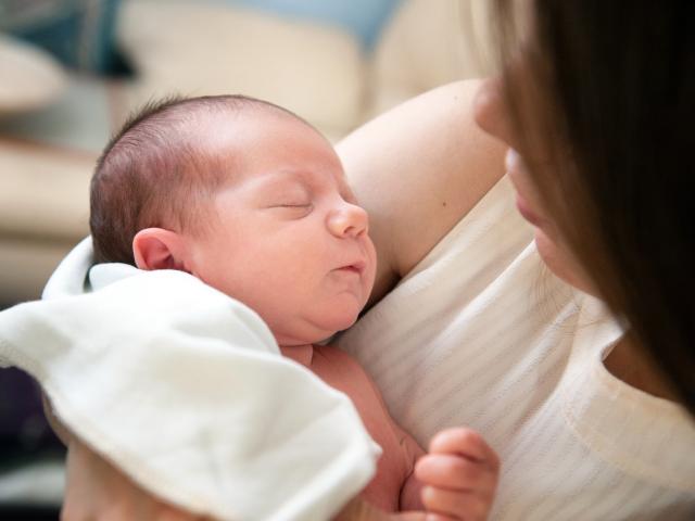 Mother holding a baby