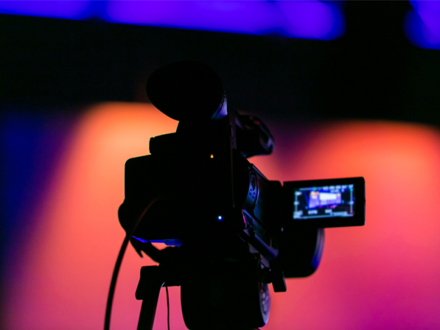 TV camera in silhouette
