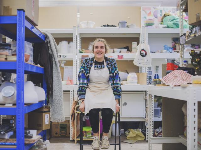 Photo of Charlotte Manser in a workshop