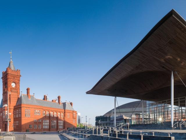 Senedd and Pierhead building against a blue sky